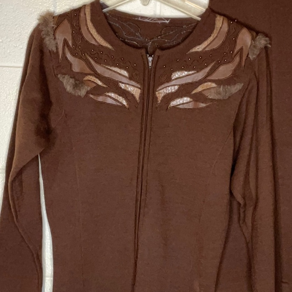 Beautiful very lightly worn knit two piece suit. VERY DETAILED. Leather & beads.